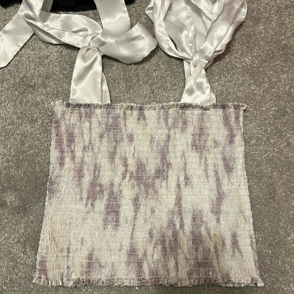 CUTEST most flattering top I have put on! Worn a couple times.